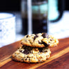 A stack of eggless New York Style Chocolate Chip Walnut Cookies by La Artisan Bakery