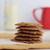 Stack of Almond flour Chocolate Chip cookies on a wooden surface with a blurred background