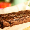 Close-up of a chocolate brownie loaf with a blurred background