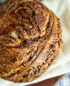 Close up of a Classic sourdough bread on a wooden board 