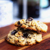 A stack of eggless New York Style Chocolate Chip Walnut Cookies by La Artisan Bakery