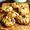 New York Chocolate Chip Walnut Cookies on a wooden board