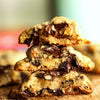 New York Chocolate Chip Walnut Cookies on a wooden board